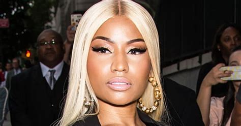 Nicki Minaj bares breasts in 'double nip slip' .